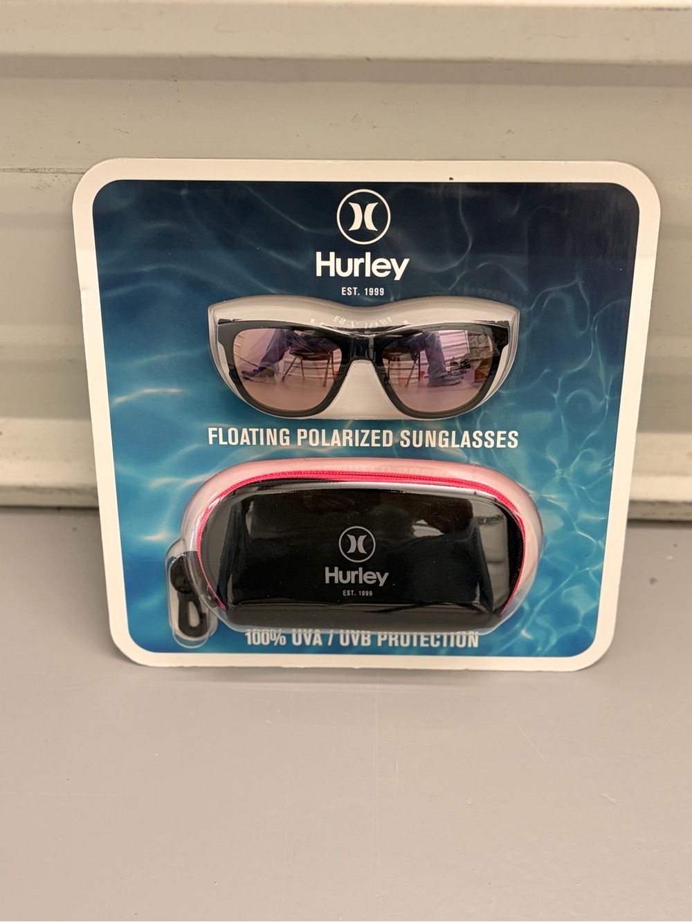 Hurley Floating Sunglasses with Black Frames and Pink Accents